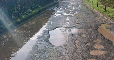 The pothole-riddled road that's been given its own swear jar after being named the 'worst ever' - www.manchestereveningnews.co.uk