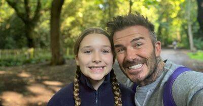 David Beckham - Harper Beckham - Nicola Peltz - David Beckham dotes over daughter Harper as pair beam for selfie during walk - ok.co.uk
