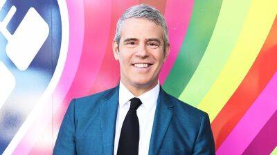 Andy Cohen Grabs Curling Iron and Burns His Fingers During 'Watch What Happens Live' - www.etonline.com