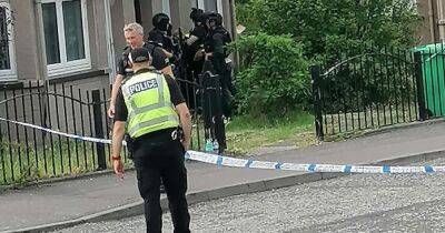 Armed police surround home in Fife as residents told to lock doors - www.dailyrecord.co.uk - Scotland - county Young - city Fife