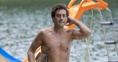 James Argent cliff jumps and soaks up the Spanish sun as he proudly shows off 14 stone weight loss - www.ok.co.uk - Spain - Greece