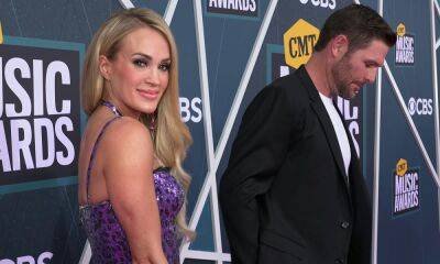 Carrie Underwood - Mike Fisher - Carrie Underwood and husband Mike Fisher have very different approaches when it comes to socialising - hellomagazine.com - USA