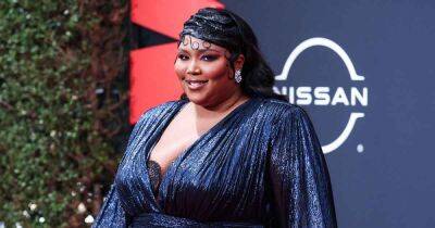 Lizzo Attempts Her Viral ‘About Damn Time’ Dance in the Same Balenciaga Tape Look Kim Kardashian Wore: Watch! - www.usmagazine.com - Britain - Texas
