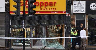 "We just heard banging and shouting and everyone ran outside": Alarming moment car smashes into jewellery store in front of shocked bystanders during Curry Mile 'armed robbery' - www.manchestereveningnews.co.uk - Manchester
