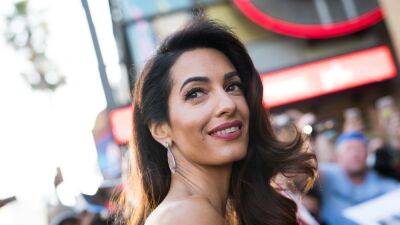 Amal Clooney's Strapless White Minidress Is Summer in Dress Form - www.glamour.com