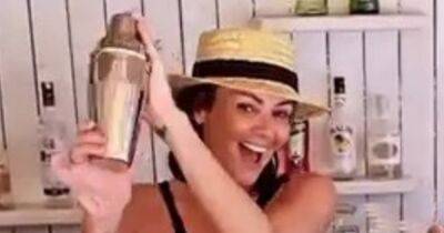 Martine McCutcheon beams as she makes cocktails in black bikini on sun-drenched holiday - www.ok.co.uk - county Jack - Turkey
