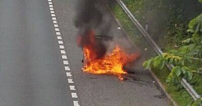 Video shows horrifying moment car becomes engulfed in flames on busy bypass - www.manchestereveningnews.co.uk