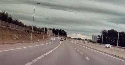 Driver filmed speeding down wrong side of Scots motorway in heart-stopping footage - dailyrecord.co.uk - Scotland
