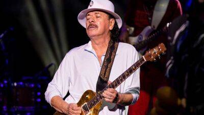 Carlos Santana - Carlos Santana Hospitalized After Collapsing Onstage From 'Exhaustion and Dehydration' - etonline.com - Pennsylvania - city Santana - Lake - Michigan