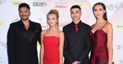 Christine Macguinness - Peter Andre - Emily Macdonagh - Aj Pritchard - Emily Andre - Princess Andre - Emily Andre and stepdaughter Princess match in red gowns at charity ball with Peter and Junior - ok.co.uk