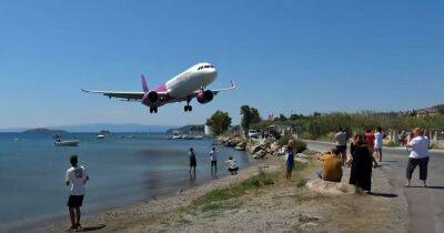 Plane makes 'lowest ever landing' at island airport in heart-stopping video - dailyrecord.co.uk - Greece
