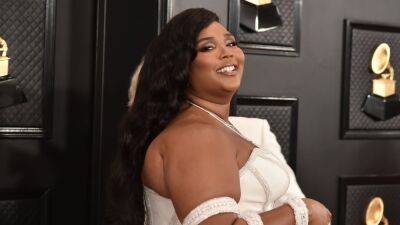 Lizzo Sparked Elopement Rumors With New Wedding Dress Post - glamour.com - county Wright