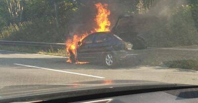 Thick smoke billows into sky as car bursts into flames on M60 - manchestereveningnews.co.uk - Manchester