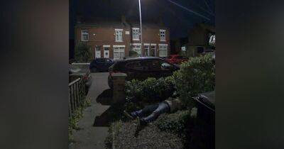 Surprise as doorbell camera shows drunken man ASLEEP in stranger's front garden - www.manchestereveningnews.co.uk - Manchester