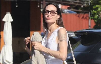 Brad Pitt - Angelina Jolie - Angelina Jolie Kicks Off Her Week by Grocery Shopping with Son Knox - justjared.com