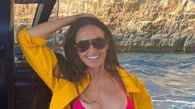 Demi Moore’s Colorful Bikini Is Serious Swimsuit Goals - glamour.com - county Moore