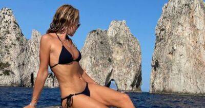 Amanda Holden looks incredible as she sunbathes in tiny bikini on yacht in Capri - www.dailyrecord.co.uk - Italy - Greece