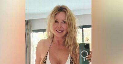 Holly Willoughby - Carol Vorderman 'breaks internet' as she stuns fans in bra and tiny shorts as she drops a dress size - manchestereveningnews.co.uk - Portugal