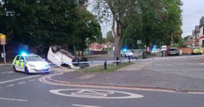 Two taken to hospital after car flips onto its roof in smash - www.manchestereveningnews.co.uk - Manchester
