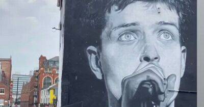 Joy Division - Ian Curtis - Rico Burton - Amazon apologise after iconic Ian Curtis mural painted over to promote new Aitch album - manchestereveningnews.co.uk - Manchester