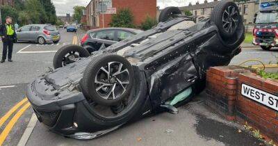 Car flips onto roof in Heywood crash - www.manchestereveningnews.co.uk - Manchester - county Stockport