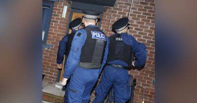 GMP arrest 30 after officers storm homes in dawn raids across Salford - www.manchestereveningnews.co.uk - Manchester - borough Manchester