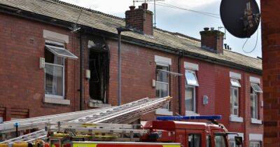 Residents escape blaze as fire crews smash through bedroom window of Manchester home - www.manchestereveningnews.co.uk - Manchester