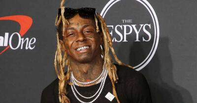 Lil Wayne sued for allegedly punching former assistant - www.msn.com