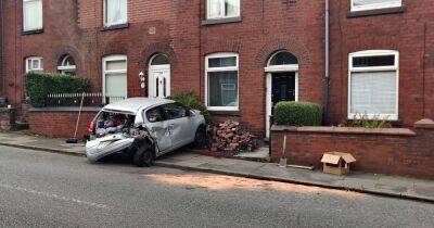 Audi driver leaves cars and garden wall wrecked after 'losing it' in residential street - www.manchestereveningnews.co.uk