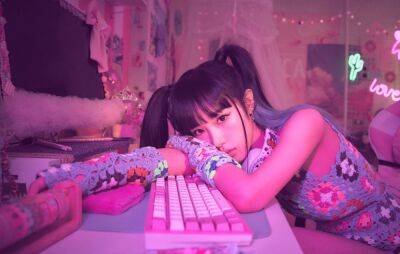 Choi Yena brings out her gamer side in new music video for ‘Smartphone’ - www.nme.com - South Korea