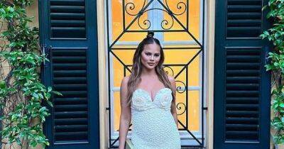 Pregnant Chrissy Teigen continues Italy getaway and flaunts growing bump in stylish looks - www.ok.co.uk - Italy