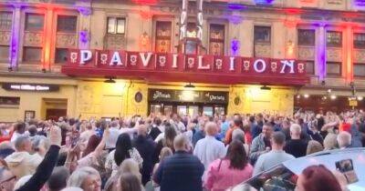 Rangers fans erupt into rousing song outside Glasgow theatre after show paused during fire drill - dailyrecord.co.uk - Scotland