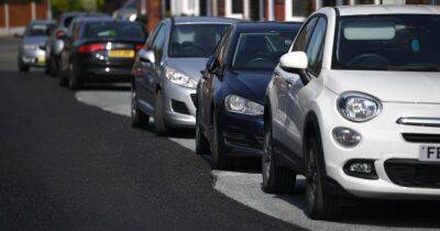 Residents left bemused after council workers resurface road AROUND their cars - www.manchestereveningnews.co.uk