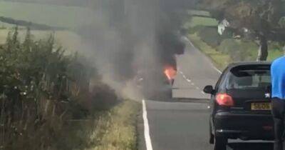 Car bursts into flames on road in Ayrshire as emergency crews race to scene - dailyrecord.co.uk - Scotland