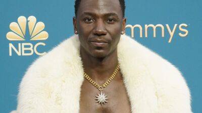 Kevin Frazier - Jerrod Carmichael - Jason Ritter - Jerrod Carmichael Reveals Why He's Shirtless and Rocking Diddy's Fur Coat on Emmys Red Carpet (Exclusive) - etonline.com - Los Angeles