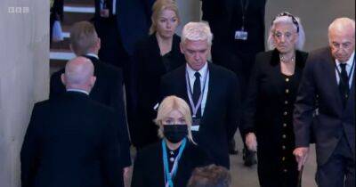 Holly Willoughby - Phillip Schofield - Sky News - Elizabeth II - ITV This Morning's Holly Willoughby looks tearful as Phillip Schofield cuts a sombre figure while seeing Queen lie in state - manchestereveningnews.co.uk - Britain - county Hall - city Westminster, county Hall