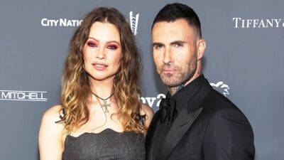 Behati Prinsloo Shares First Photo of Growing Baby Bump, Expecting 3rd Child With Adam Levine - www.etonline.com