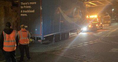 Amazon lorry becomes stuck under bridge in Salford - manchestereveningnews.co.uk