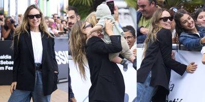 Olivia Wilde - Olivia Wilde Greets Fans - And Babies! - While Arriving for San Sebastian Film Festival - justjared.com - Spain - county Sebastian