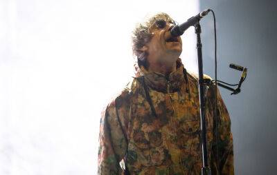 Watch Liam Gallagher perform with surviving members of Foo Fighters - www.nme.com
