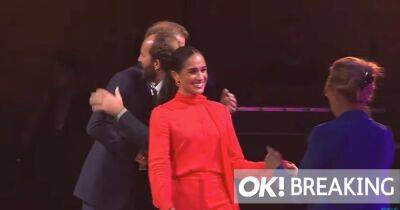 prince Harry - Meghan Markle - Williams - Meghan Markle is regal in red as she’s cheered on first stop of unofficial Royal tour - ok.co.uk - Britain - Manchester - county Windsor - city Windsor