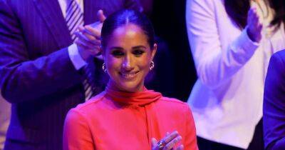 Meghan Markle fans hail Duchess's £2.4k all-red outfit as 'iconic' and 'inspirational' - www.ok.co.uk - county Hall - city Manchester, county Hall