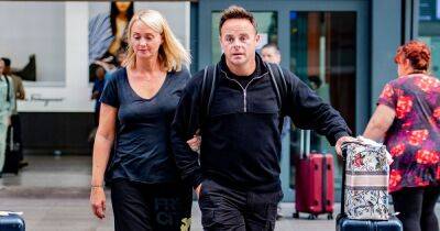 Ant McPartlin and Anne-Marie walk arm in arm as they jet home from anniversary getaway - www.ok.co.uk
