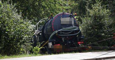 Emergency services respond after tanker veers off road and smashes into bushes - www.manchestereveningnews.co.uk - Manchester