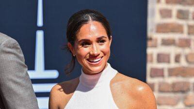 Meghan Markle Is the Picture of Understated Polish in High-Waisted Trousers - www.glamour.com - USA - Manchester - Germany - Poland