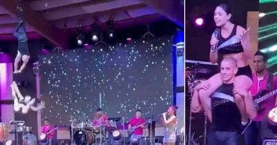 Acrobat slipped and crashed down to the stage as singer continued show at a restaurant in Mexico - www.msn.com - Mexico
