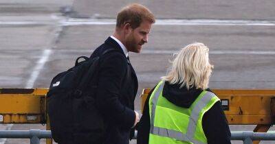 prince Harry - prince Charles - Prince Harry - Elizabeth Ii II (Ii) - Royal Family - prince Charles Iii III (Iii) - Prince Harry comforts airport worker by putting an arm round her during solo London return - ok.co.uk - Britain - Scotland - county King And Queen