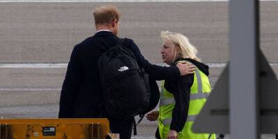 Prince Harry Appears to Comfort Worker While Boarding Flight After Queen Elizabeth's Passing - www.justjared.com - Britain - Scotland