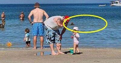 Family left terrified as they spot hidden detail in background of beach picture - www.dailyrecord.co.uk - Australia