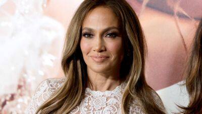 Jennifer Lopez Just Wore a Sheer Button-Down Dress Over Pants—Photos - www.glamour.com